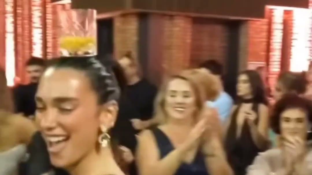 Dua Lipa dances with glass on head at cousin’s Kosovo wedding