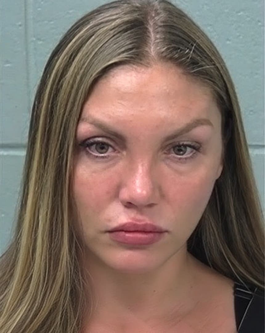 A drunk Russian passenger tried to open the door on a New York-bound flight, court documents say